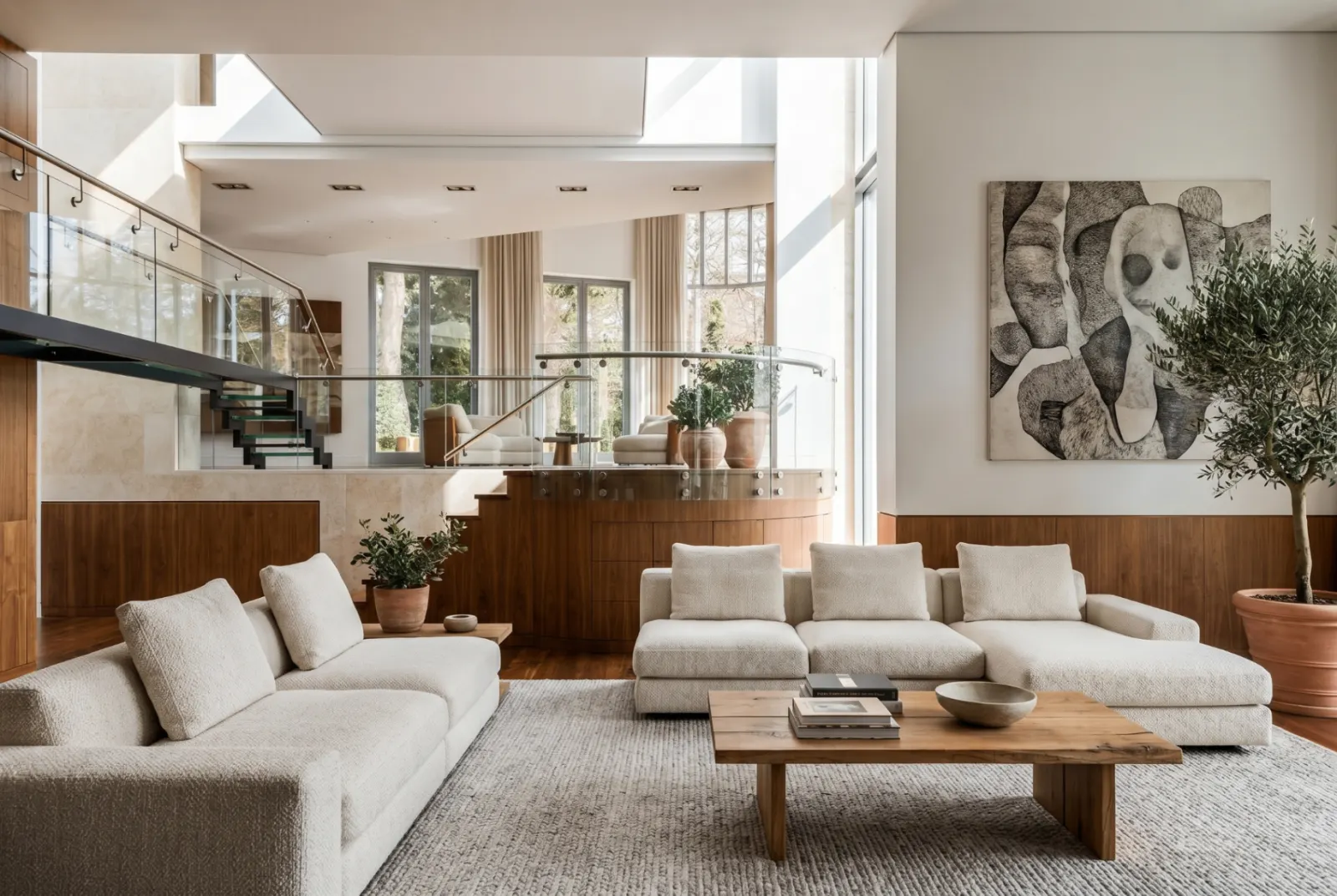 Premium real estate website hero featuring an open-plan living room with mezzanine interior